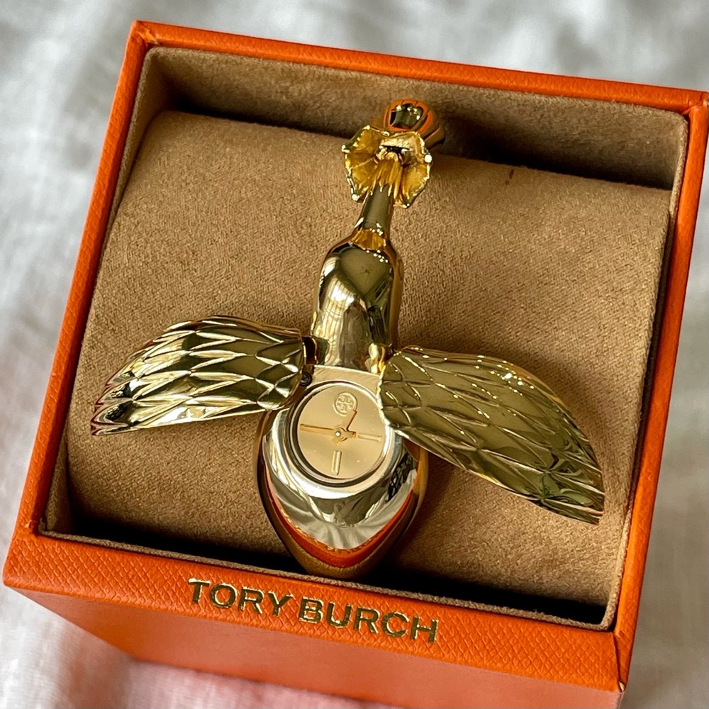 Tory Burch hummingbird bangle watch, like new, currently at Saks for $375.